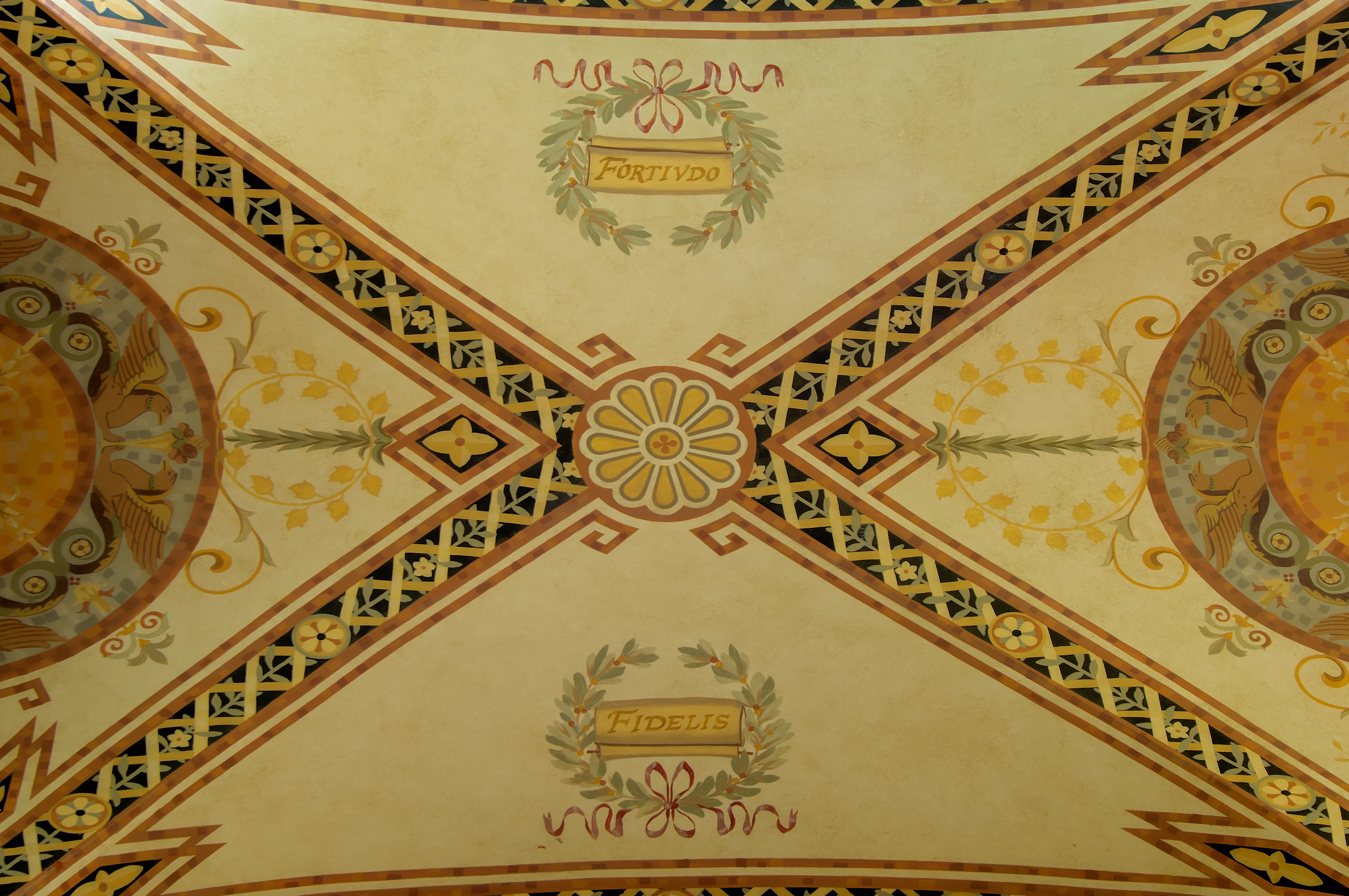 Hand-finished plaster and painted ornament on a loggia ceiling